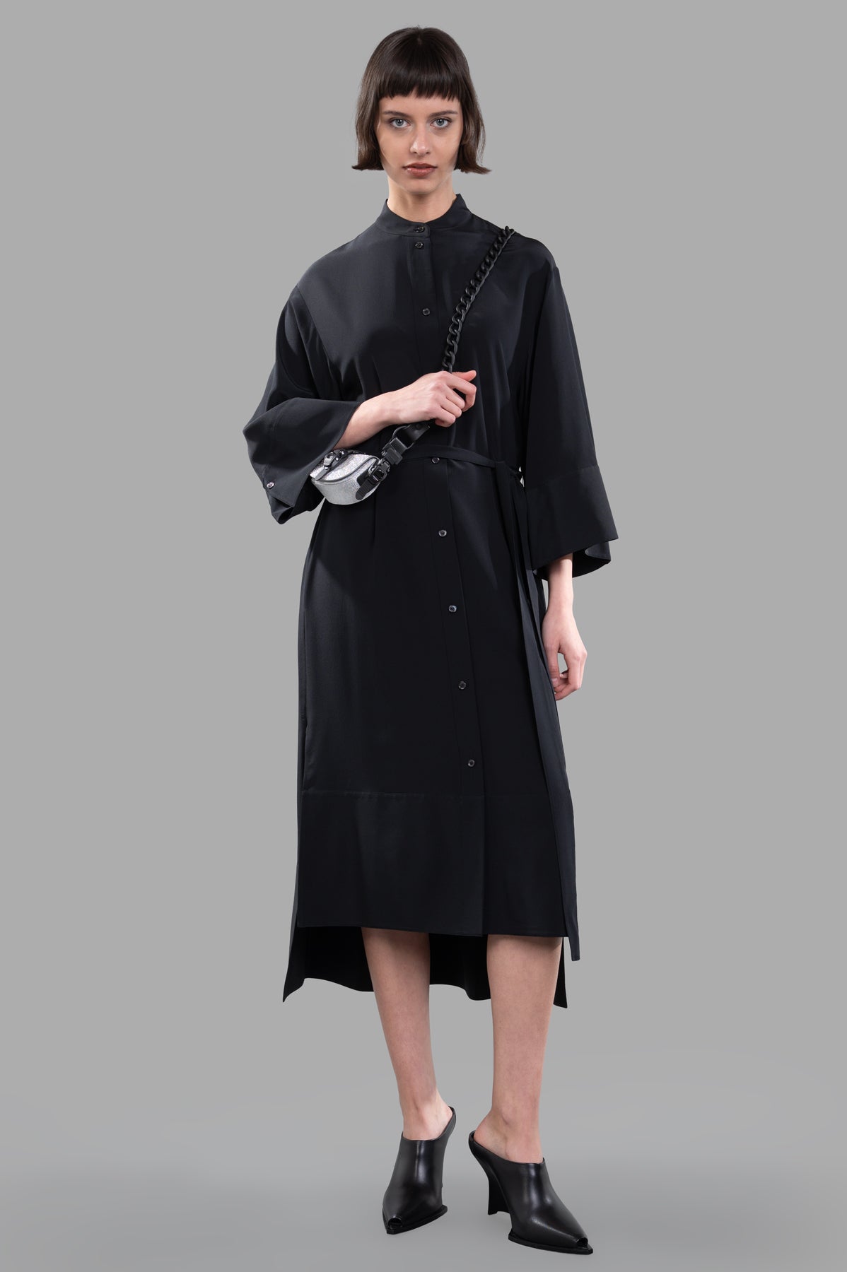 Joseph Crepe de Soie Silk Dress in black, on-model, front view, highlighting wide sleeves and step hemline.