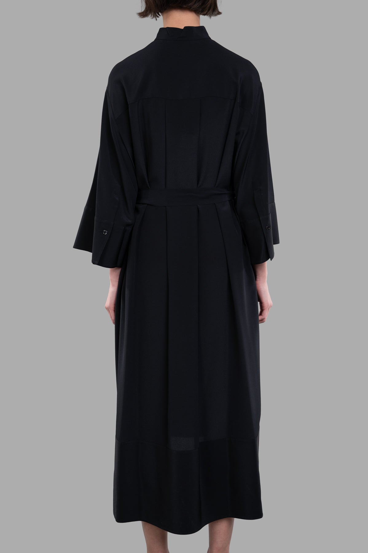 Joseph. Back view of Crepe de Soie Silk Dress in black, featuring wide sleeves and relaxed-fit silken texture.