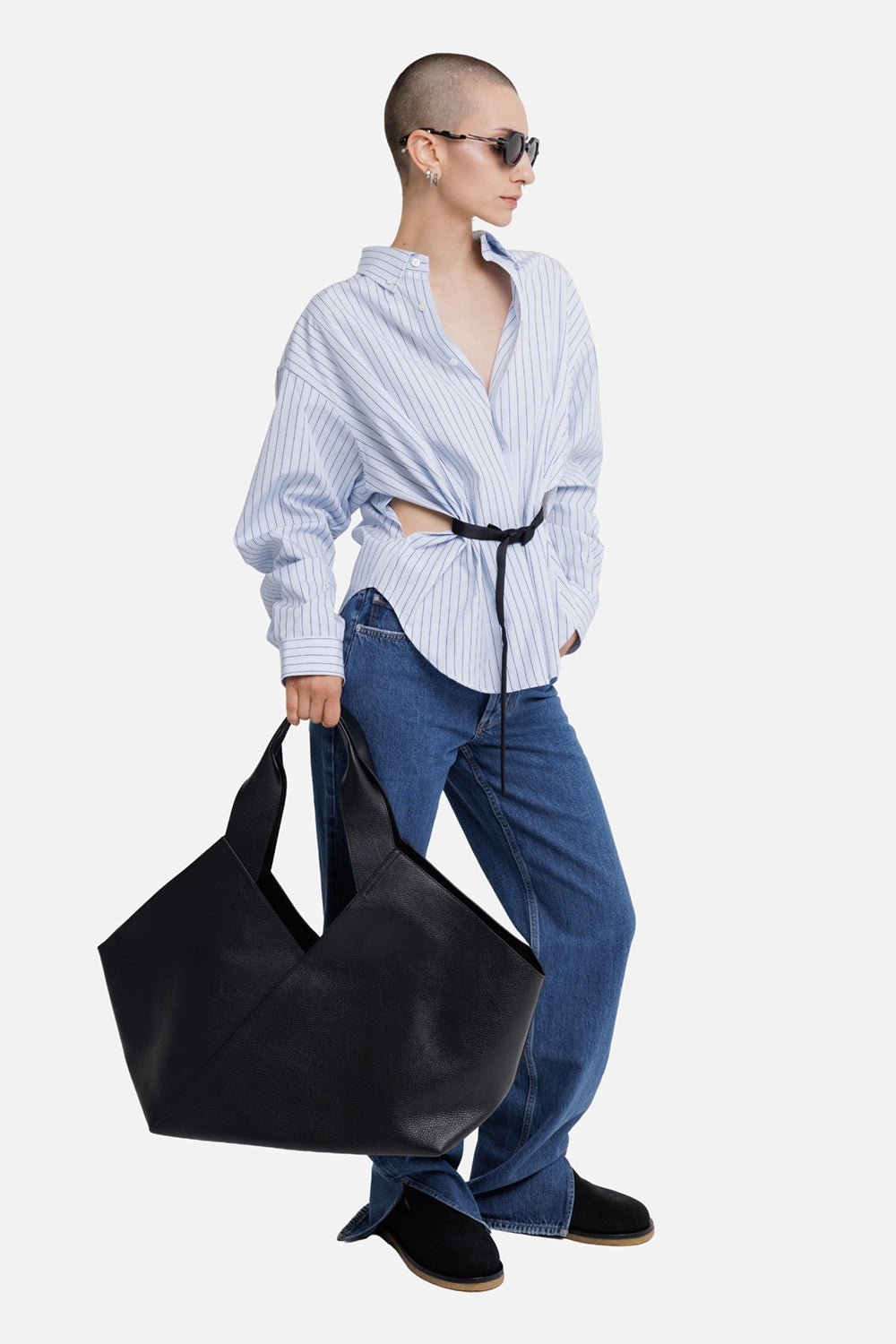 Vaquera women's light blue striped shirt, full-length model view with black belt and waist cutouts