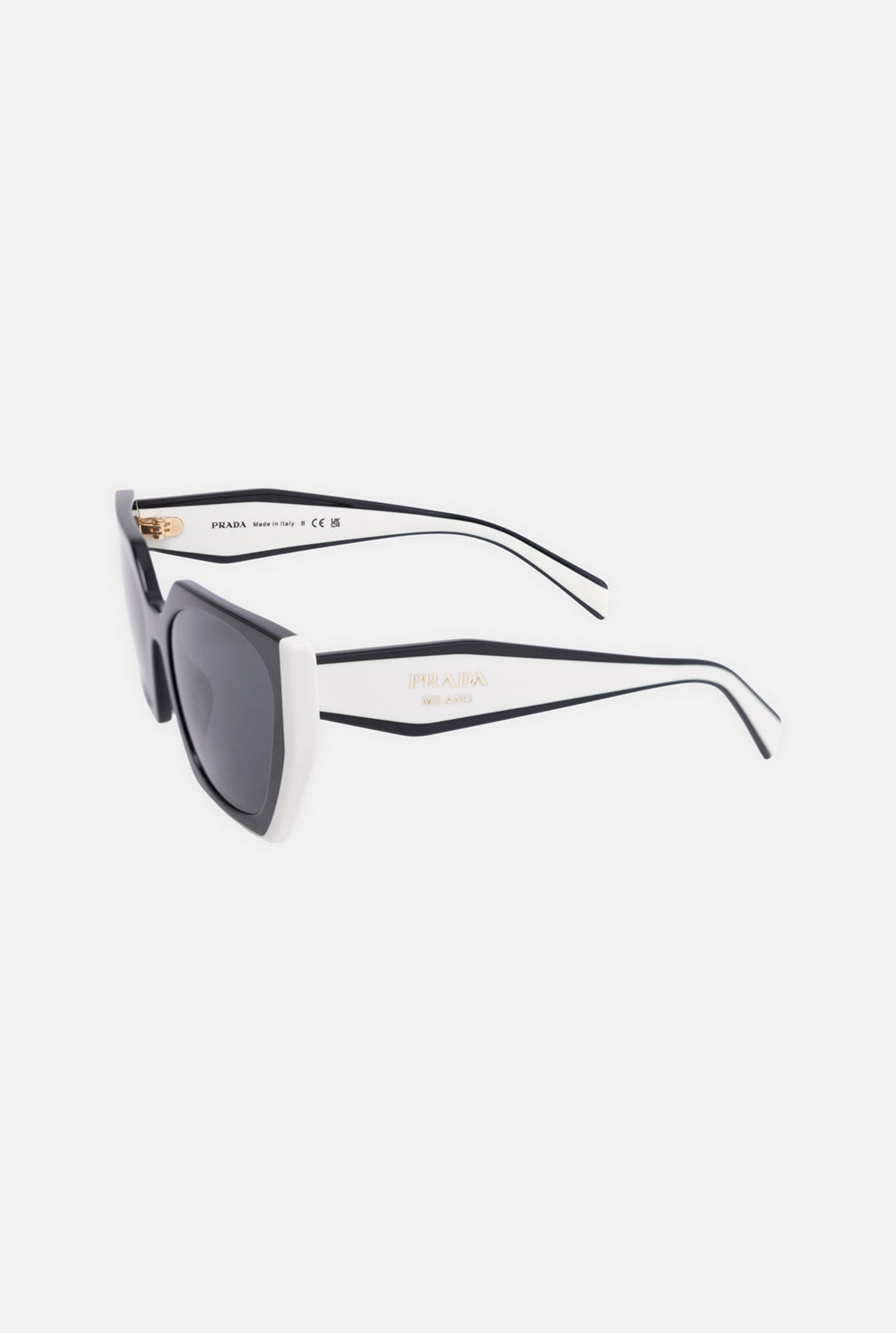 Pre-owned Prada women's sunglasses in black and talc, three-quarter view, white temples with gold logo and dark lenses
