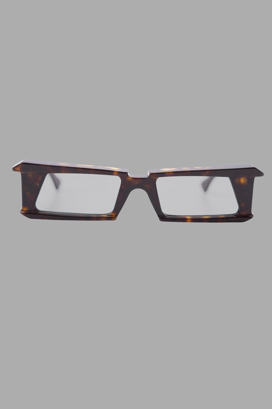 Kuboraum unisex tortoise rectangular sunglasses, front view, sharp cut brow line and light grey lenses.