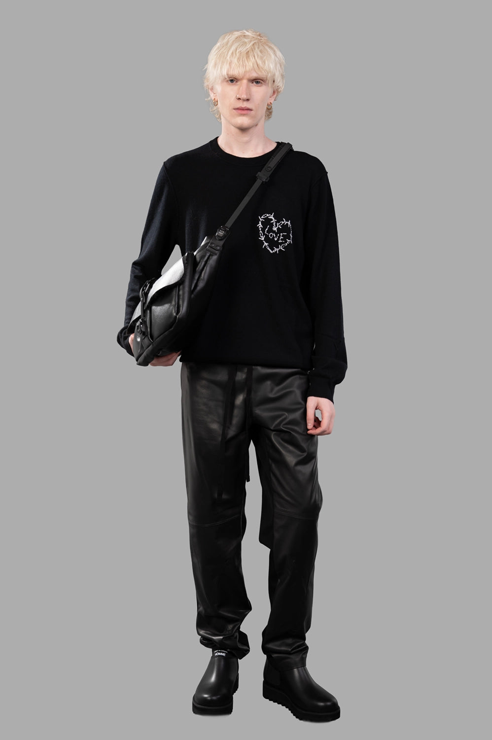 Zadig & Voltaire sweater in black, on-model full length, barbed-wire heart embroidery at chest, relaxed fit