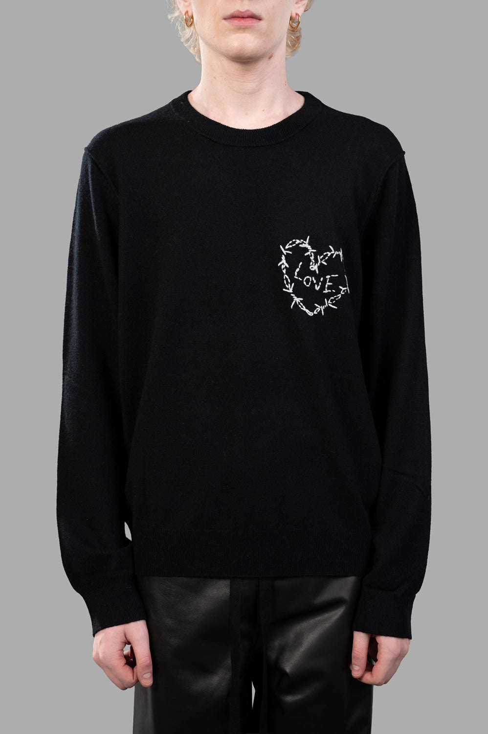 Zadig & Voltaire sweater in black, on-model half length, ribbed crewneck with barbed-wire heart chest motif