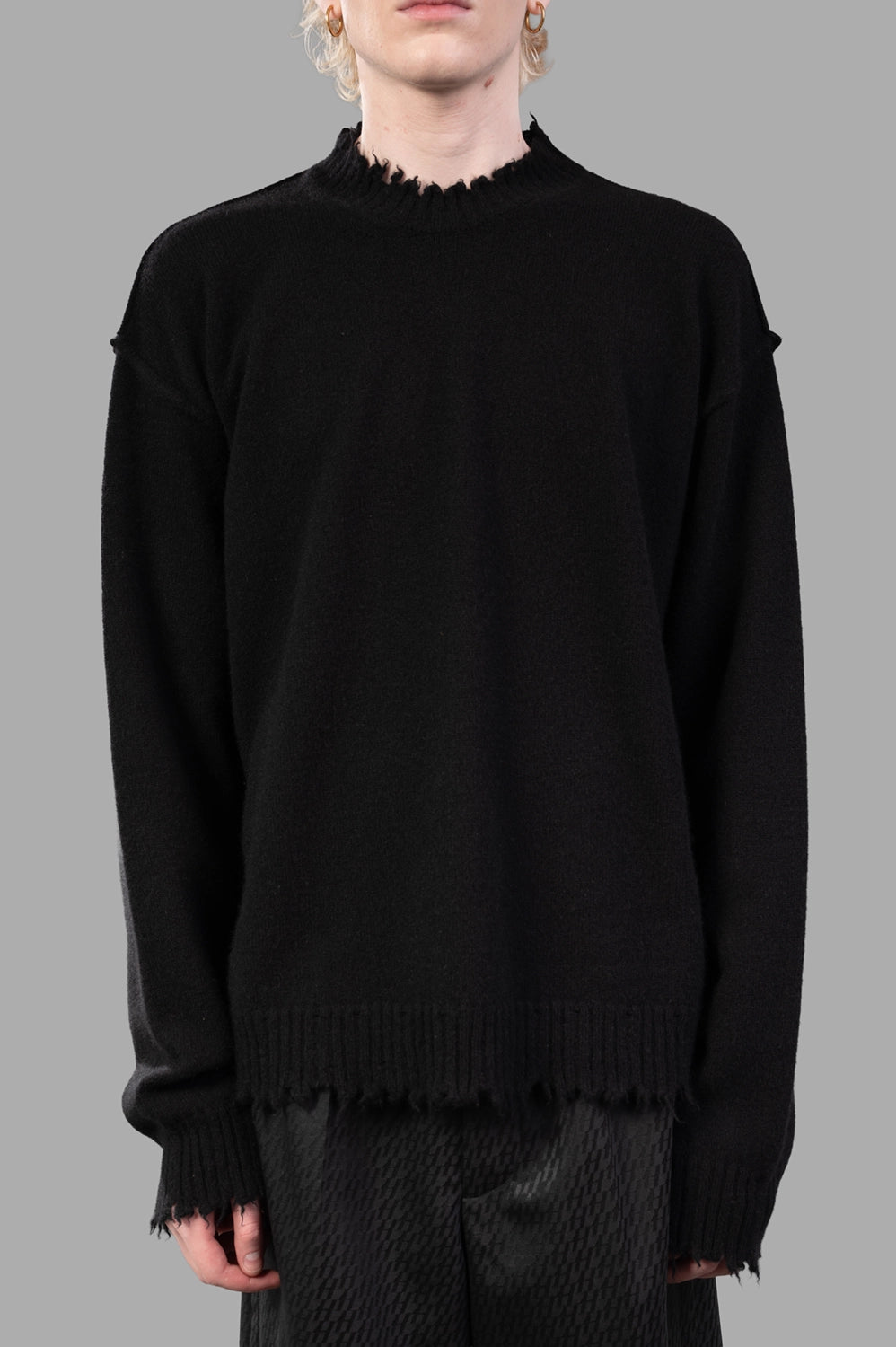 UMA WANG sweater in black, on-model half length, raw-edge cuffs and ribbed hem