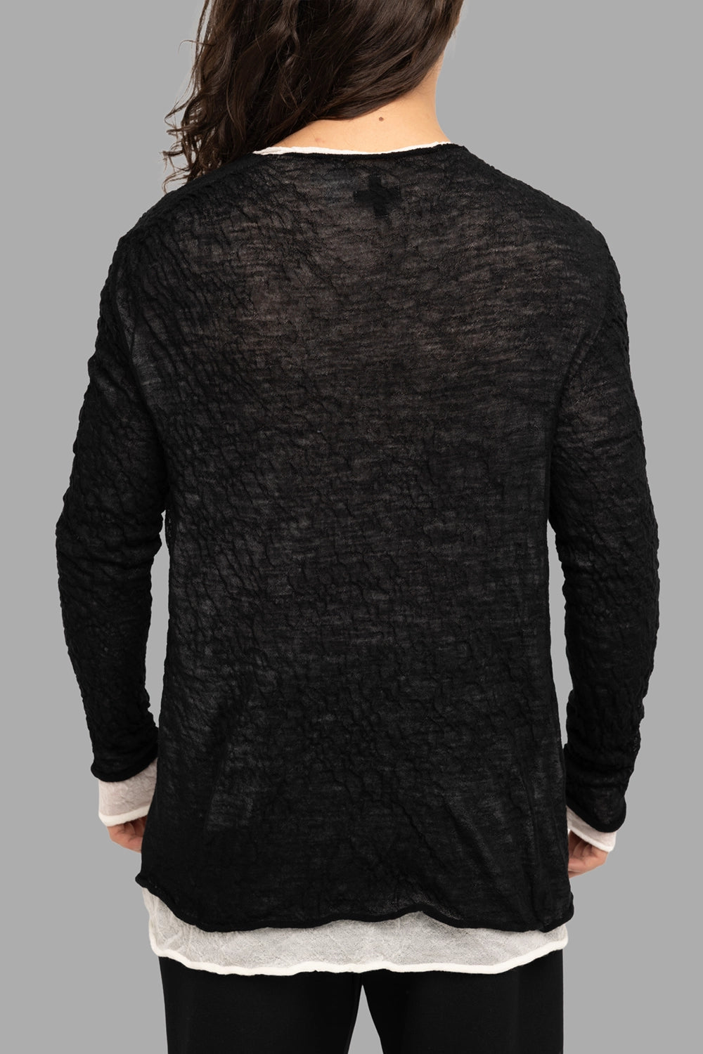 MD75 men’s sweater in black/white, back view, translucent textured knit and long sleeves