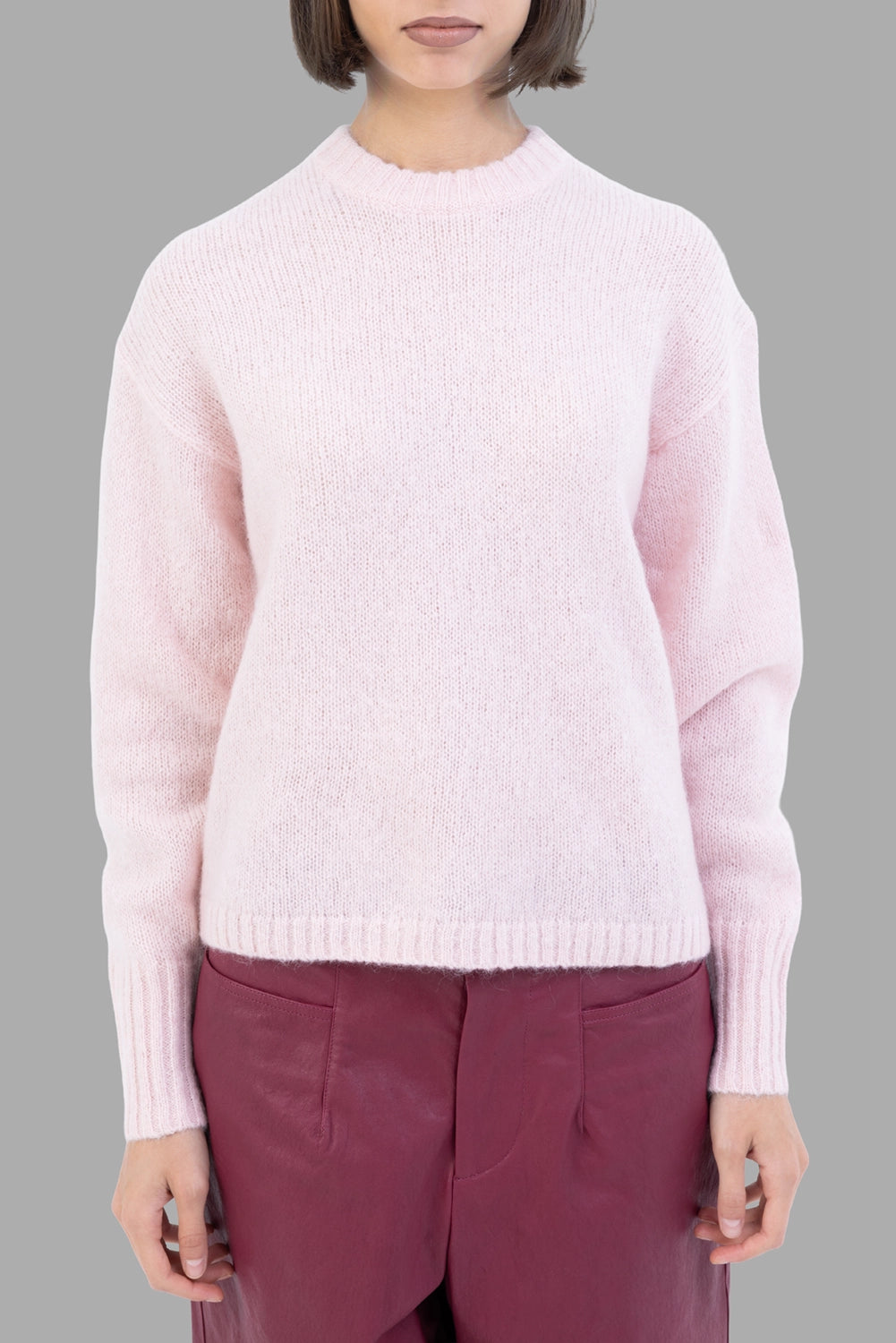 By Malene Birger women sweater in Chalk Pink, front view, dropped shoulders and ribbed hem.