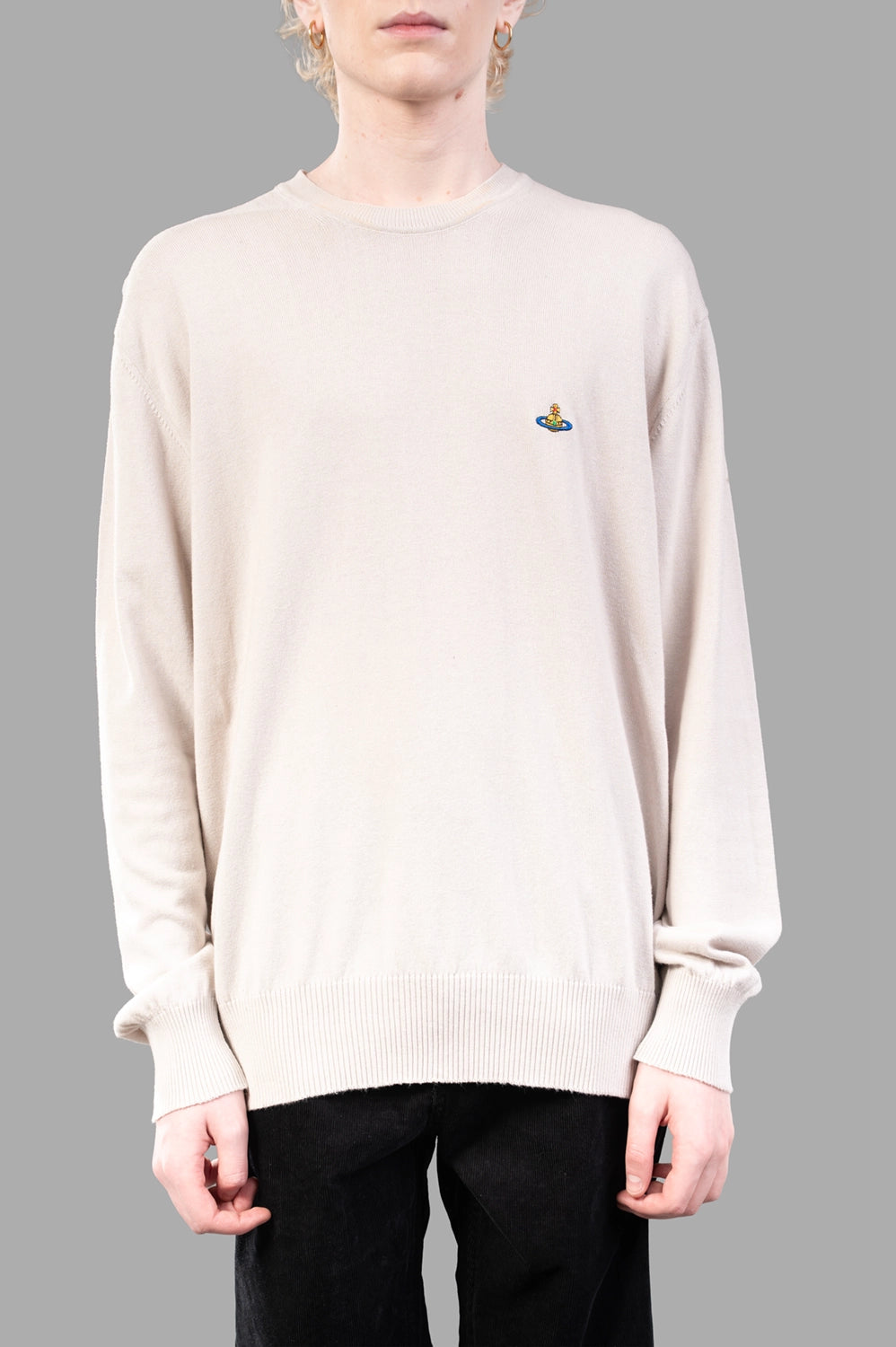 Vivienne Westwood sweater in dusty white, on-model half length, fine knit with ribbed cuffs
