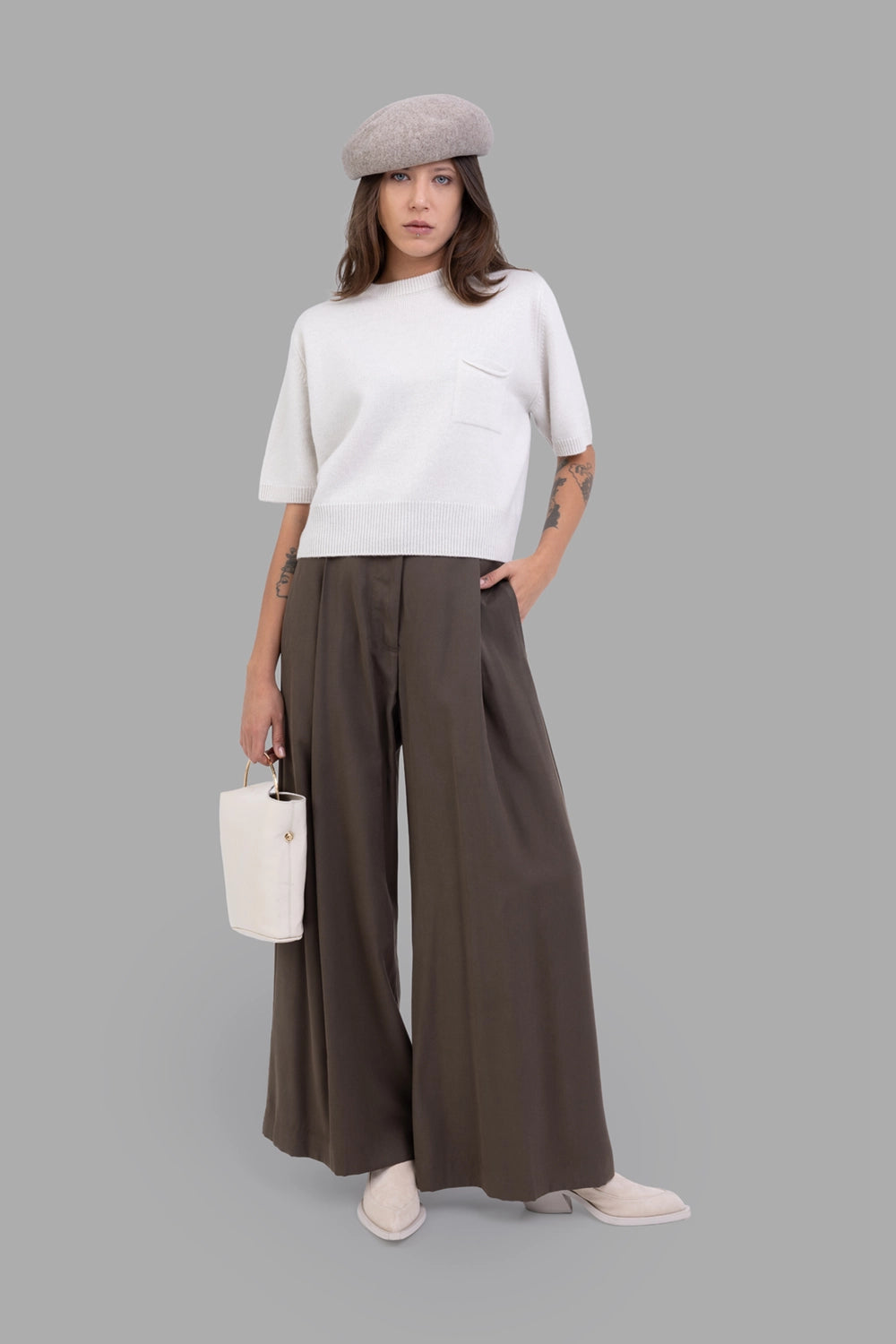 Gentry Portofino women knit top in Stucco, on-model full length, rib hem and boxy fit.