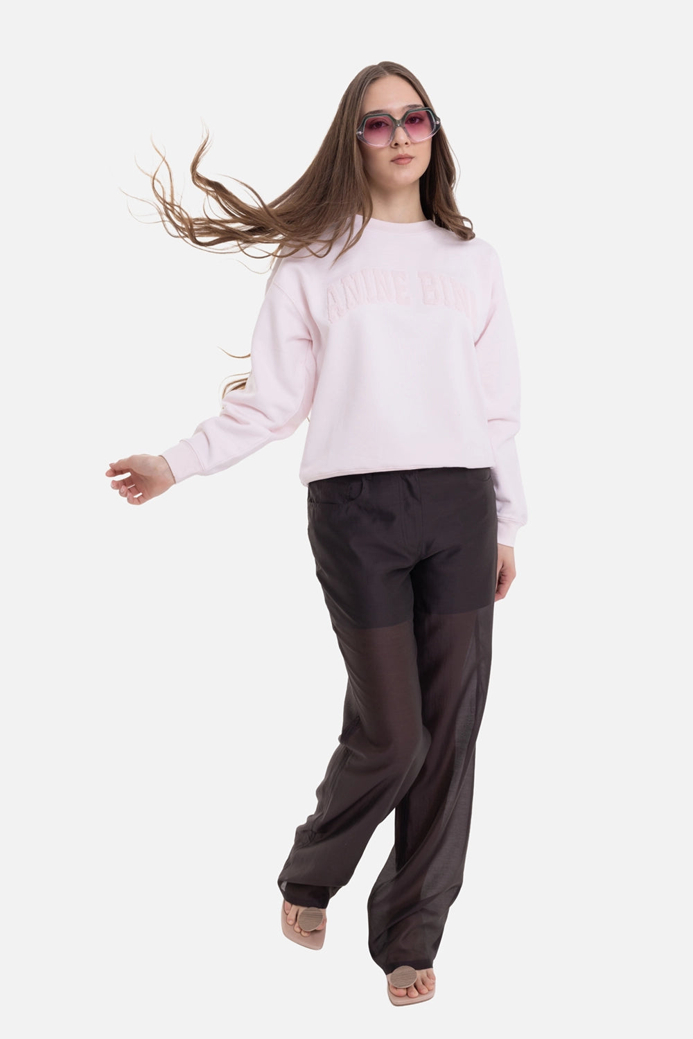 ANINE BING women's sweatshirt in powder pink, on-model full length, styled with sheer black trousers
