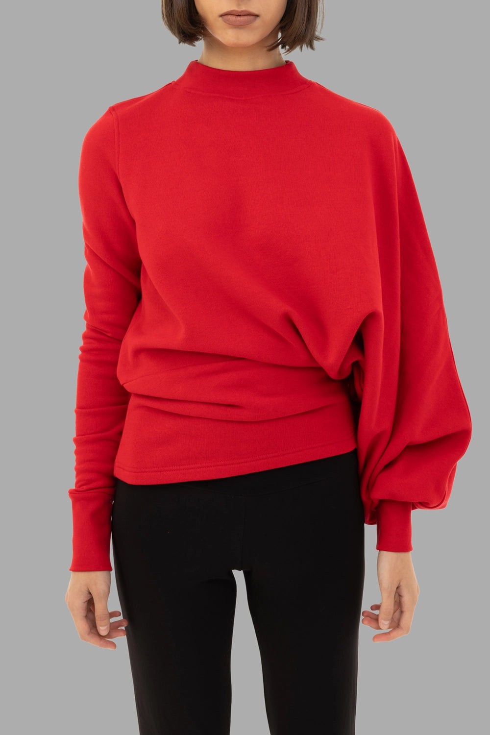 A.W.A.K.E. MODE women's sweatshirt in red, front view, asymmetric drape with single balloon sleeve