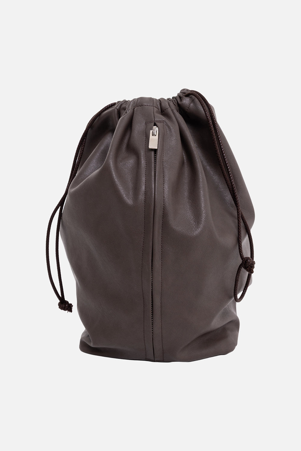 ATTACHMENT bucket bag in brown, front view with vertical zip pocket and gathered opening