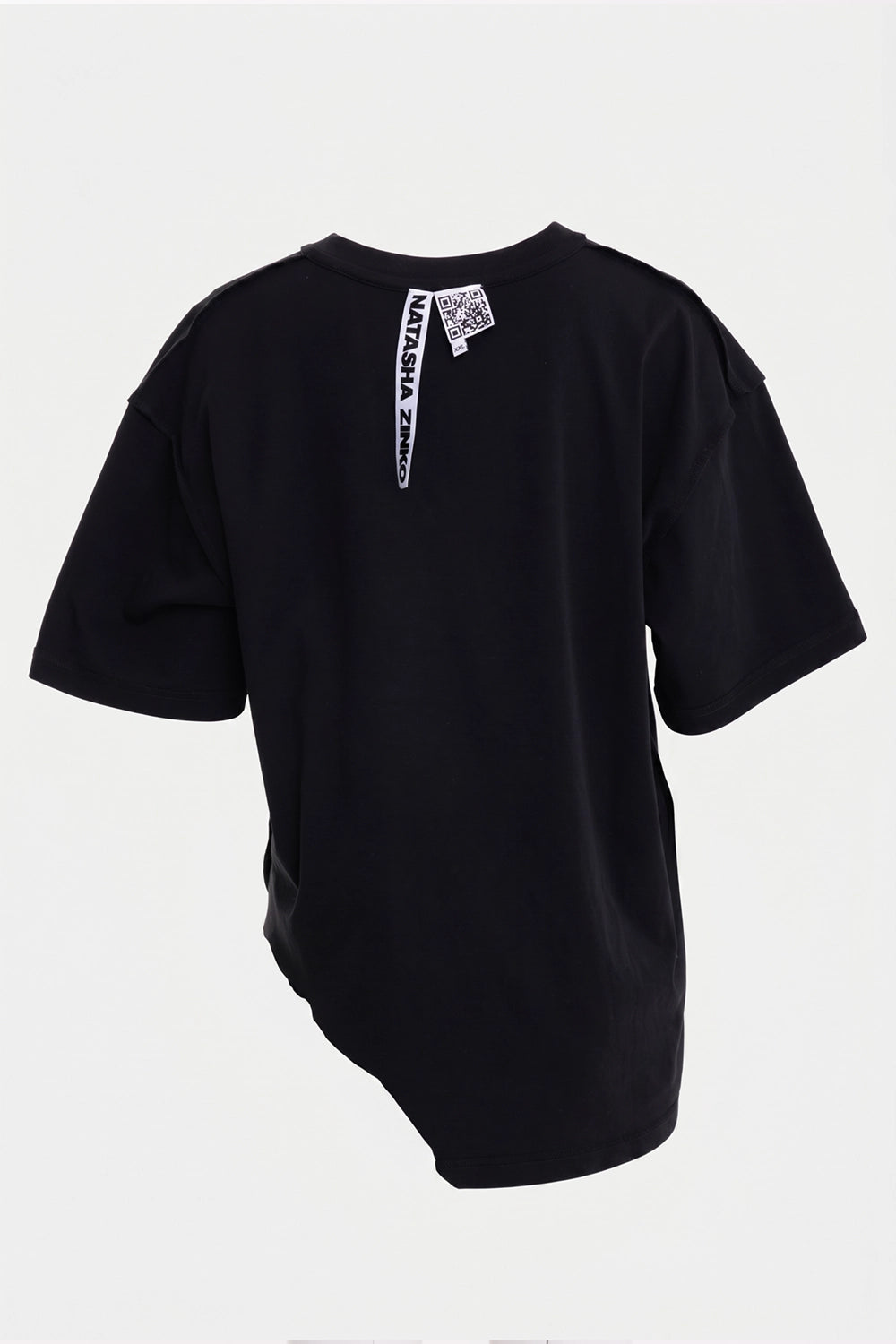 Natasha Zinko unisex T-shirt in black, back view, vertical logo tape and small QR label at neckline