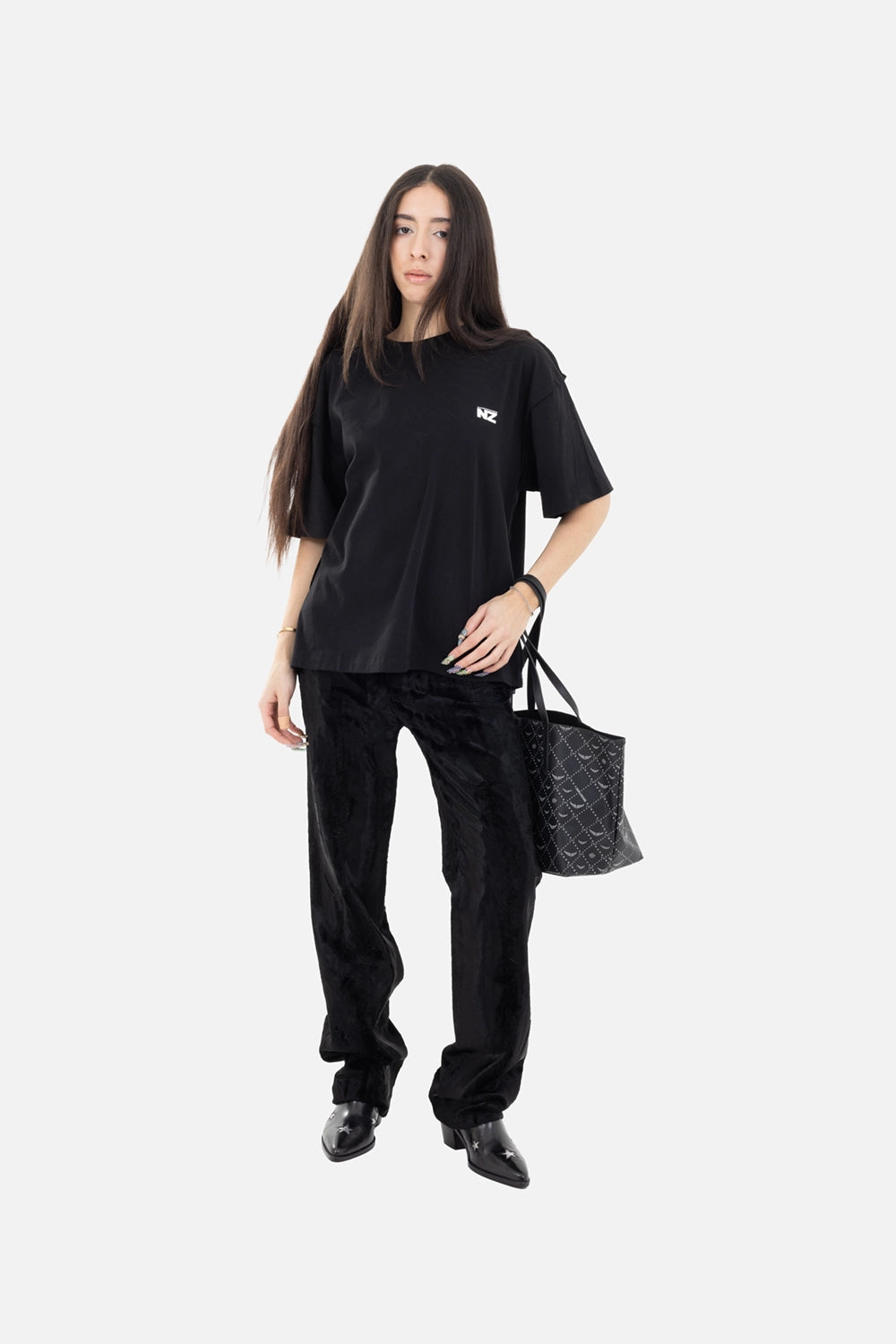 Natasha Zinko women's T-shirt in black, on-model full-length, relaxed fit with small NZ chest logo