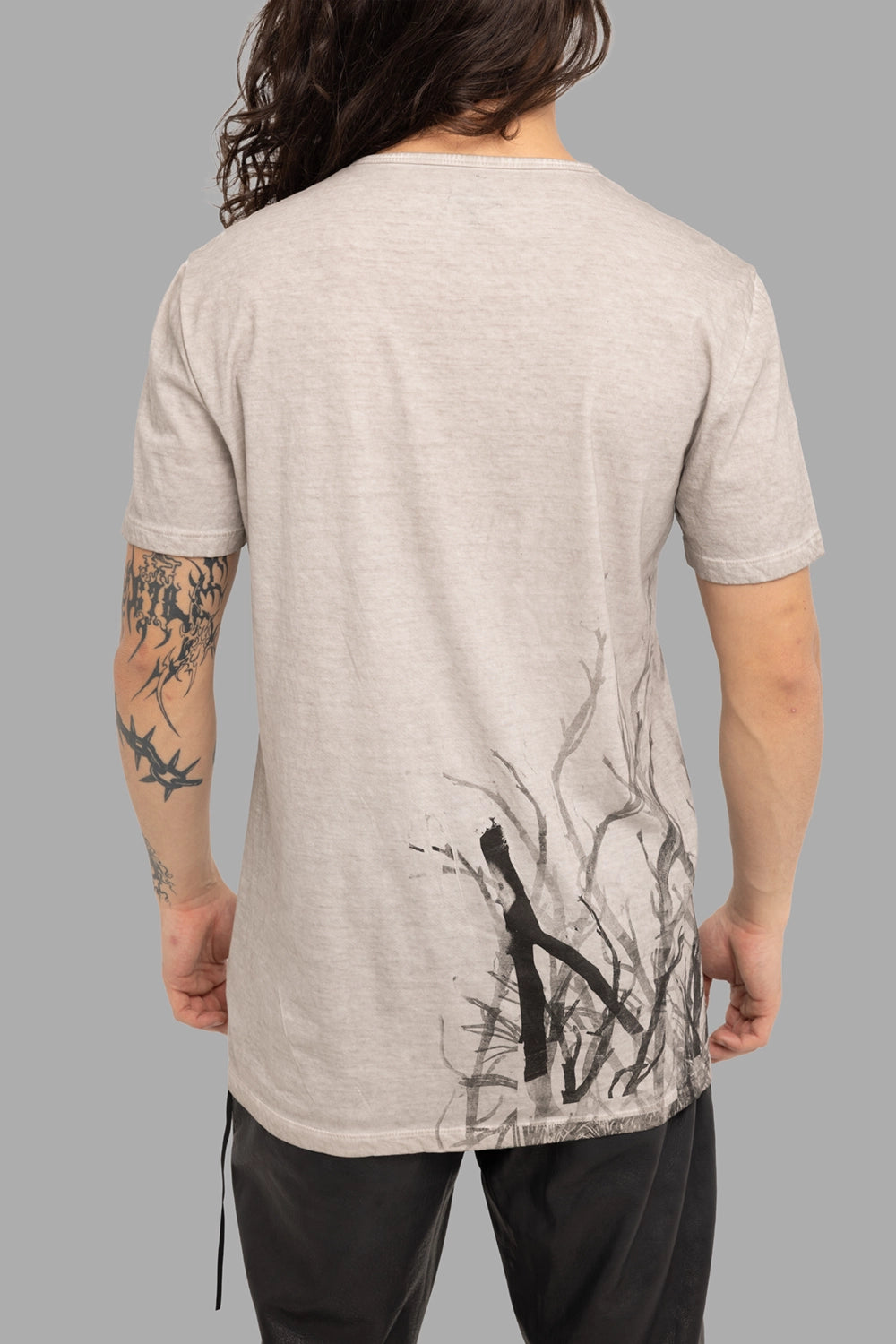 MD75 men’s T-shirt in Grey Fade, back view, brush branch graphic at right hem