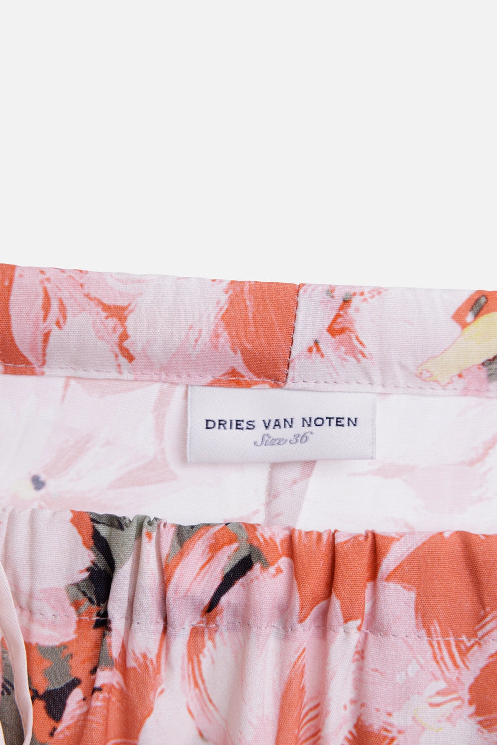 Dries Van Noten women tailored trousers in fuchsia floral, label view, size 36 waistband tag
