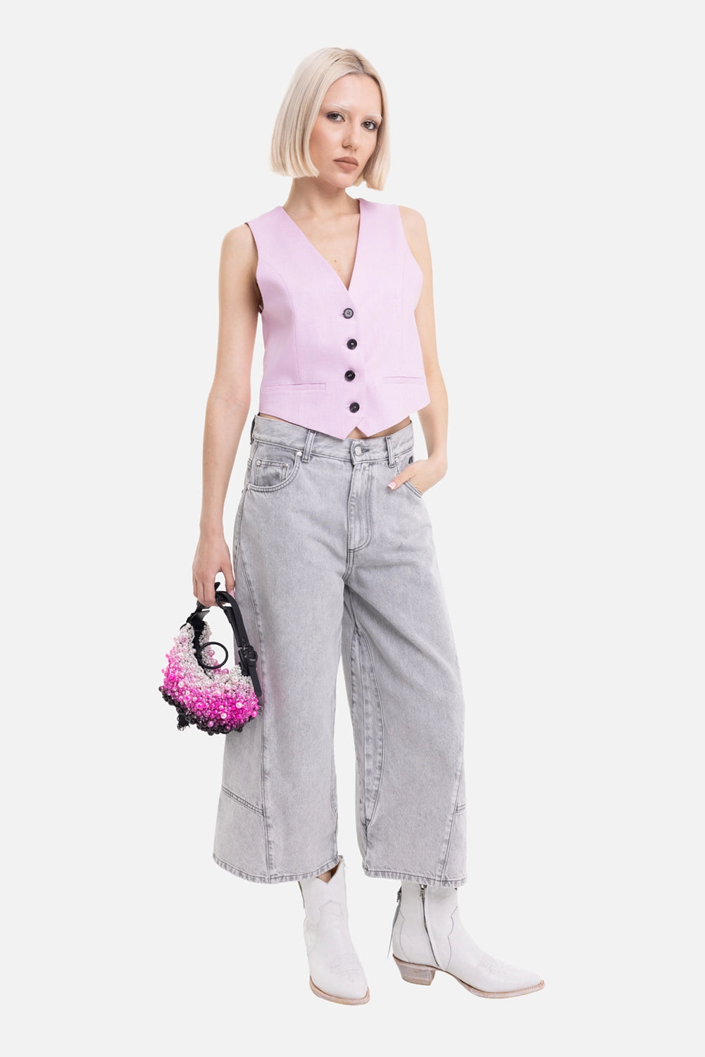 MSGM women's tailored vest in Pink, on-model full-length view, black buttons and cropped pointed hem