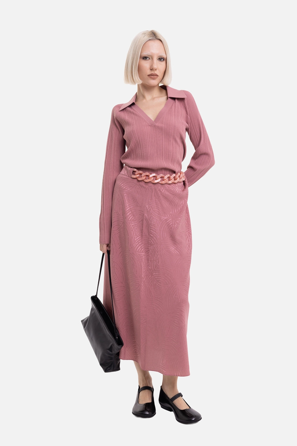JOSEPH women's Tanger skirt in Musk, on-model full-length view, resin chain belt and midi length