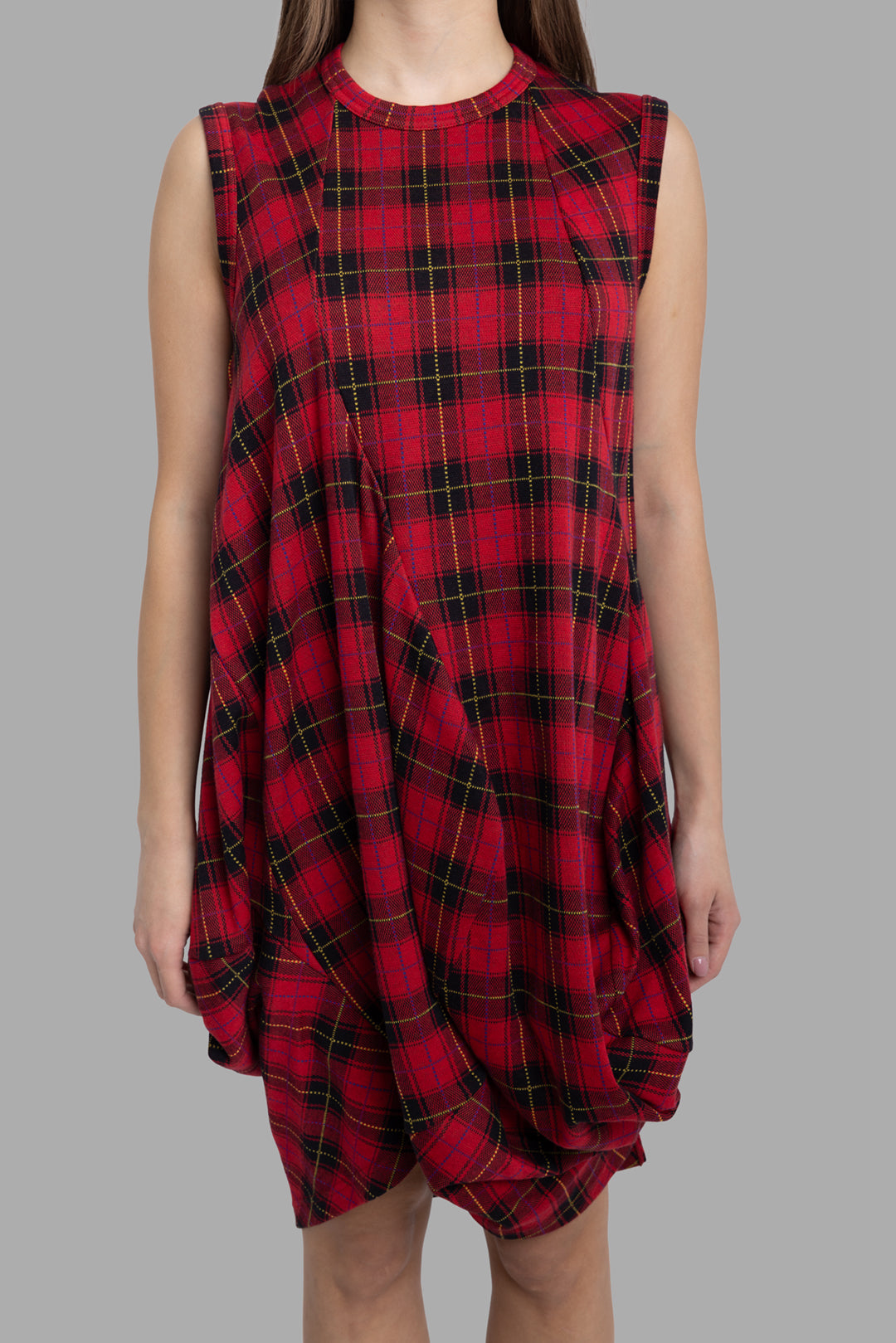 Comme des Garçons women's red tartan sleeveless dress, front view, crew neckline and draped side panels.