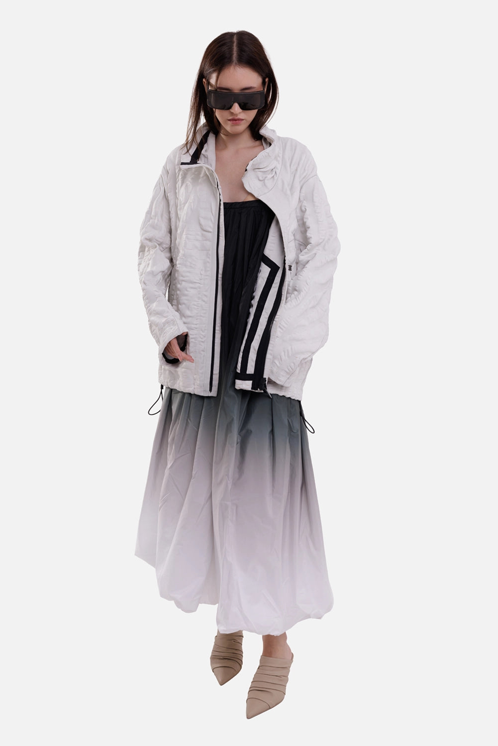 Isaac Sellam Experience women's white jacket, full-length view with high collar, black zip trim and drawcord hem