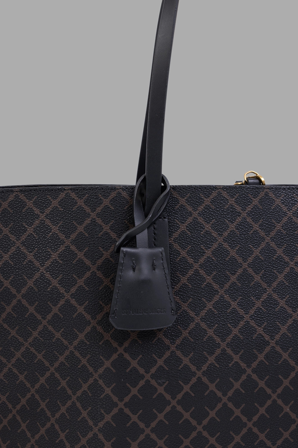 By Malene Birger women tote bag in Dark Chocolate, logo tag detail on handle and monogram texture.