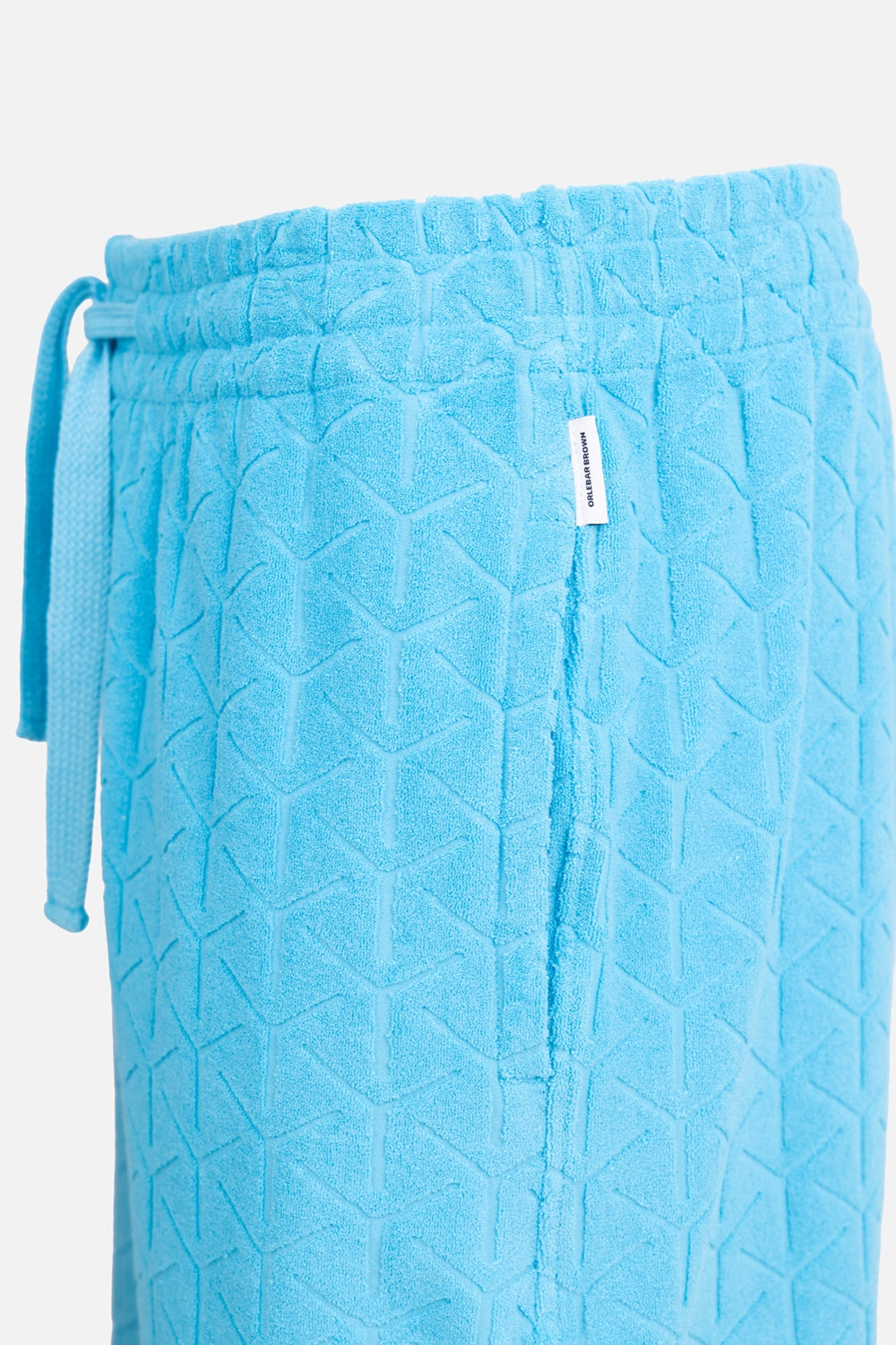Orlebar Brown mens sweat shorts in Synth Blue, logo detail, woven side tab on Reticolo towelling fabric