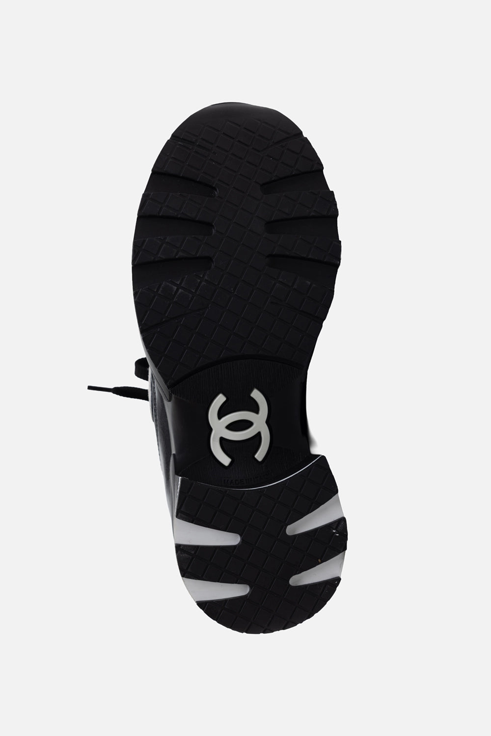 Pre-owned Chanel women's trainers in black, sole view, lugged tread with CC motif