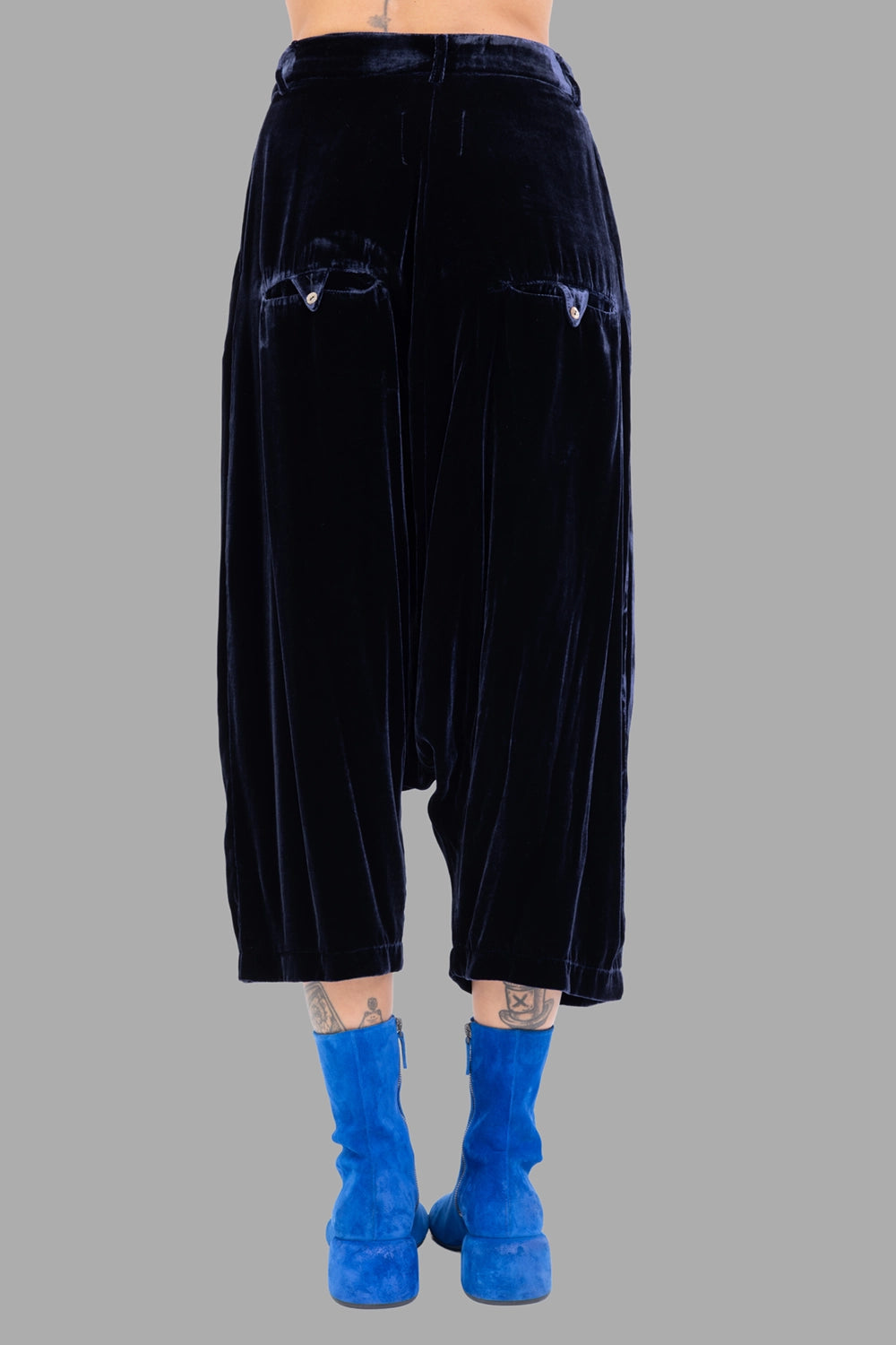 Marc Point women's velvet trousers in black, back view, twin flap pockets with buttons and curved leg