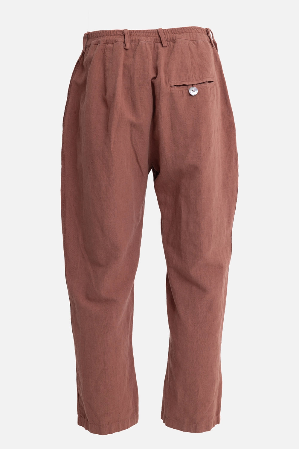 Vuscichè men's trousers in rust, back view, elastic waist and single buttoned welt pocket