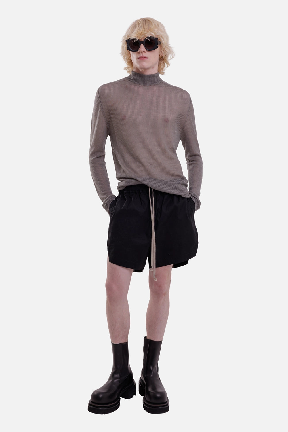 Rick Owens men's turtleneck sweater in Drk Pearl, full-length view with sheer rib knit and elongated loose fit