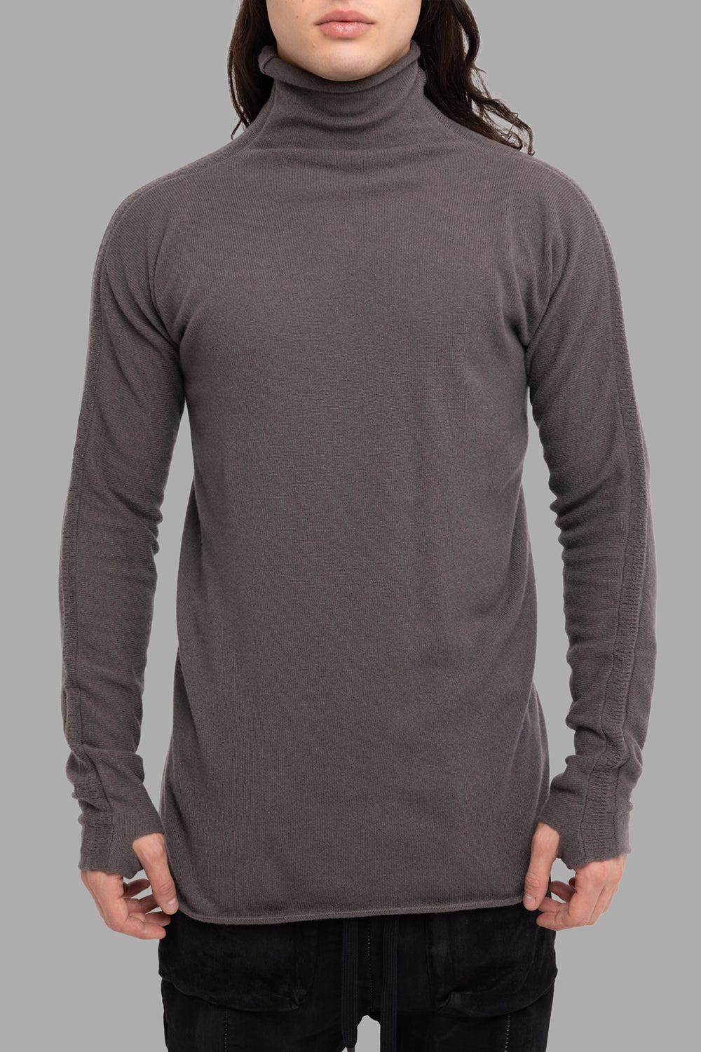 Isaac Sellam Experience men’s turtleneck sweater in kaki, front view, rib-knit with high roll neck and thumbhole-style cuffs