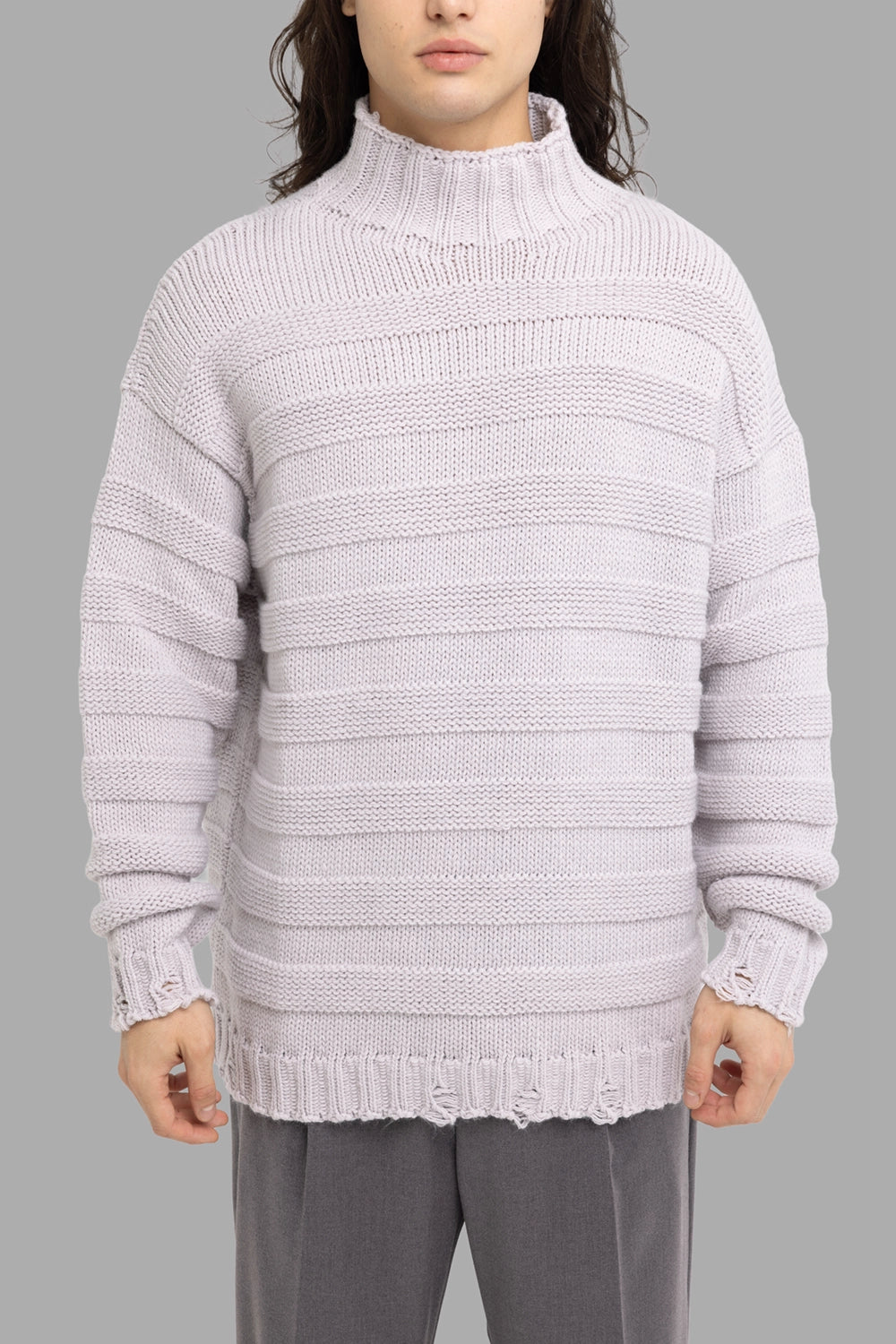 Gaëlle Paris men’s turtleneck sweater in off-white, front view, high rib neck and horizontal band knit, distressed hem