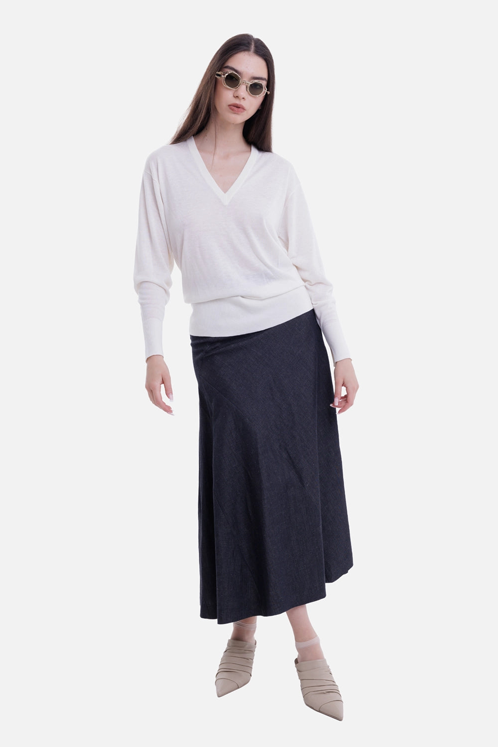 By Malene Birger women's V-neck sweater in Soft White, on-model view with dropped shoulders and wide ribbed hem
