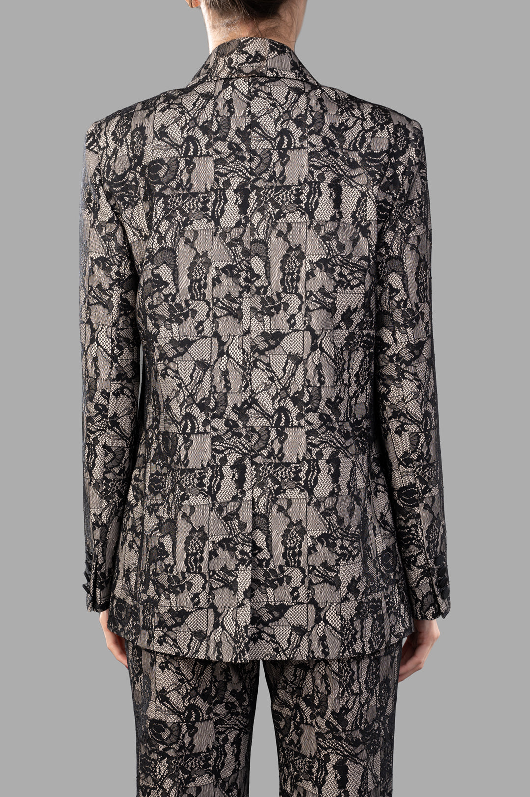 Joseph Patchwork Lace Jacket, back view showcasing intricate black lace pattern and structured fit with shoulder padding.