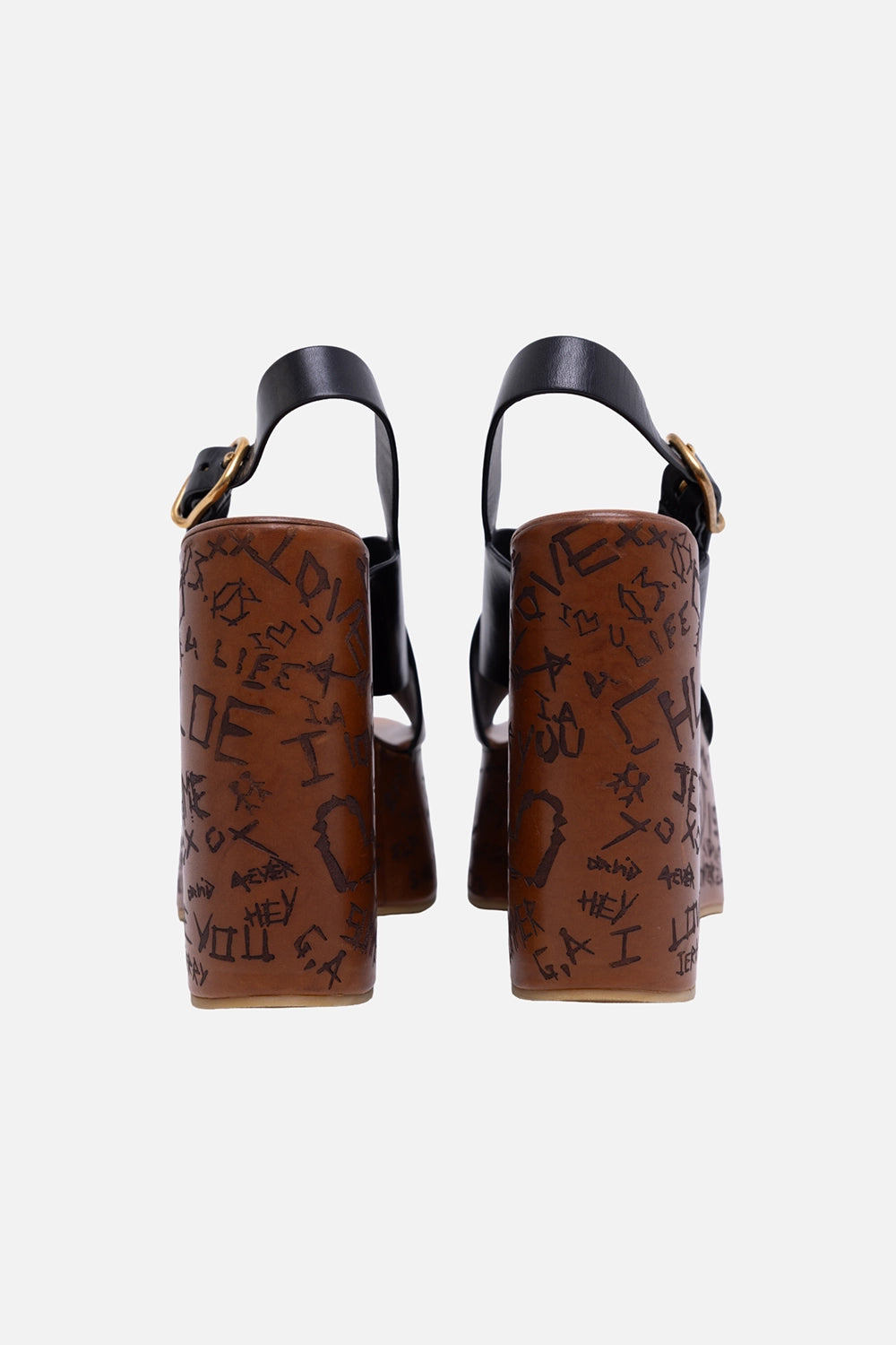 Pre-owned Chloé women’s wedge sandals in black, back view, slingback straps and engraved wedge heel