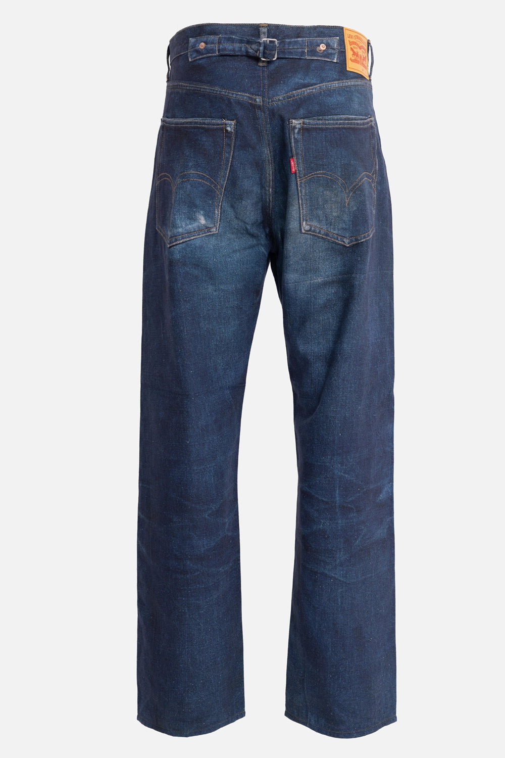 Junya Watanabe MAN men's wide-leg jeans in indigo, back view, leather patch and red pocket tab