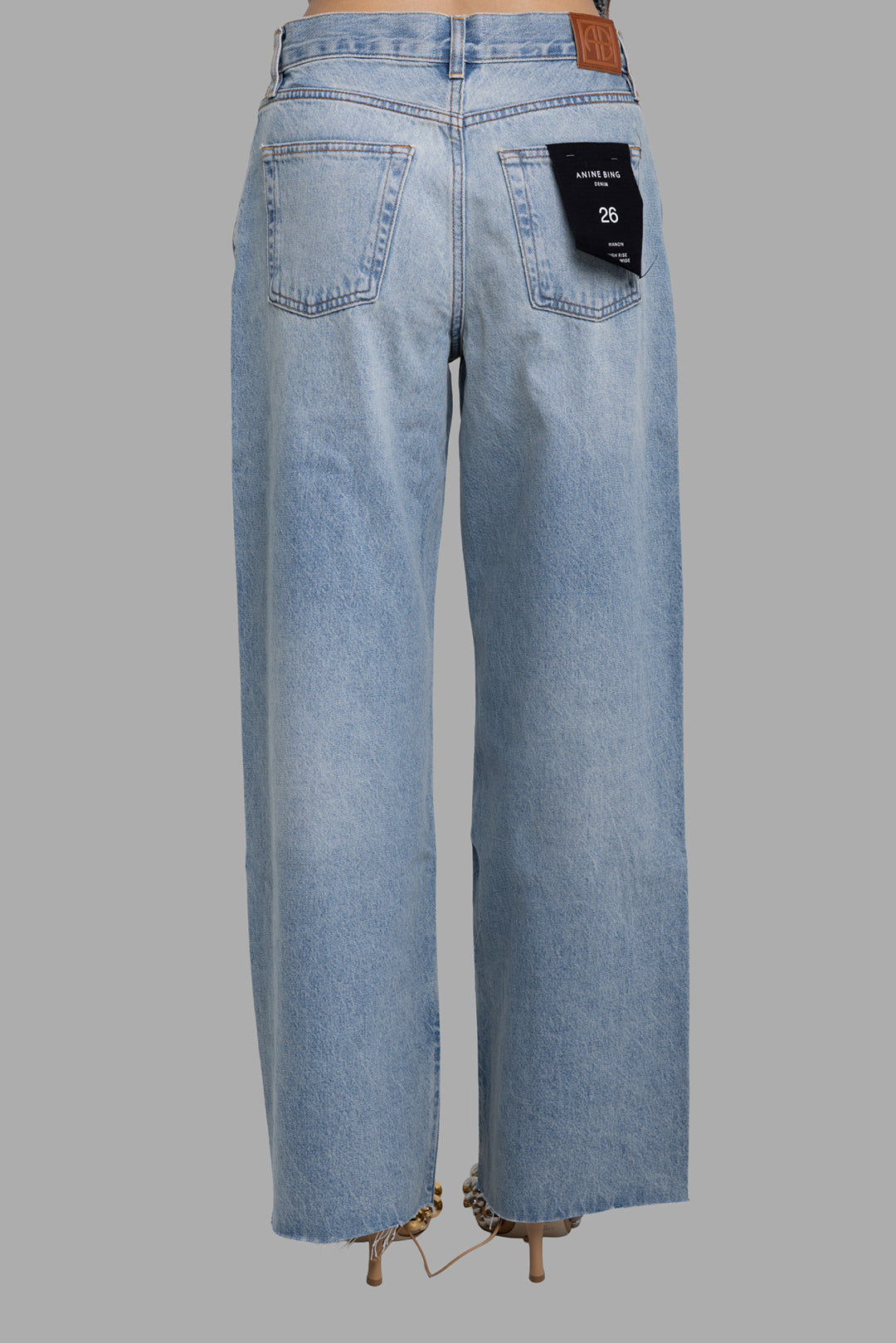 Anine Bing women's Tux Blue Manon wide-leg jeans, back view with patch pockets and logo waistband patch.