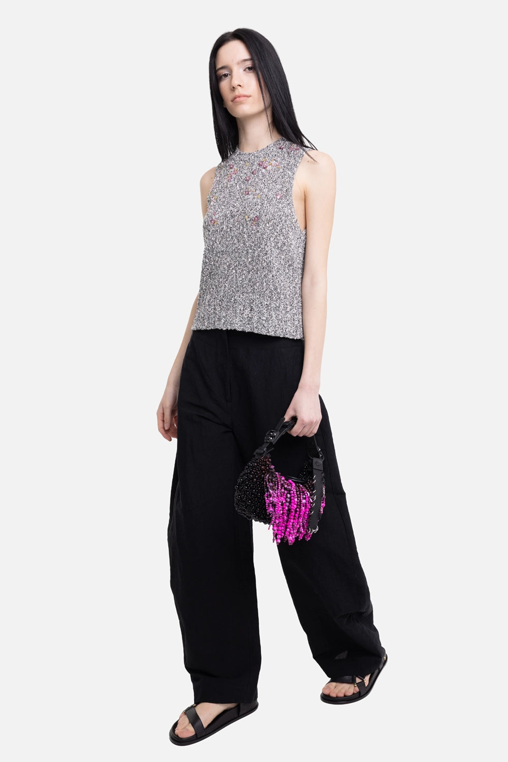 Gentry Portofino women's wide-leg trousers in black, on-model full-length view, fluid leg and sculpted volume
