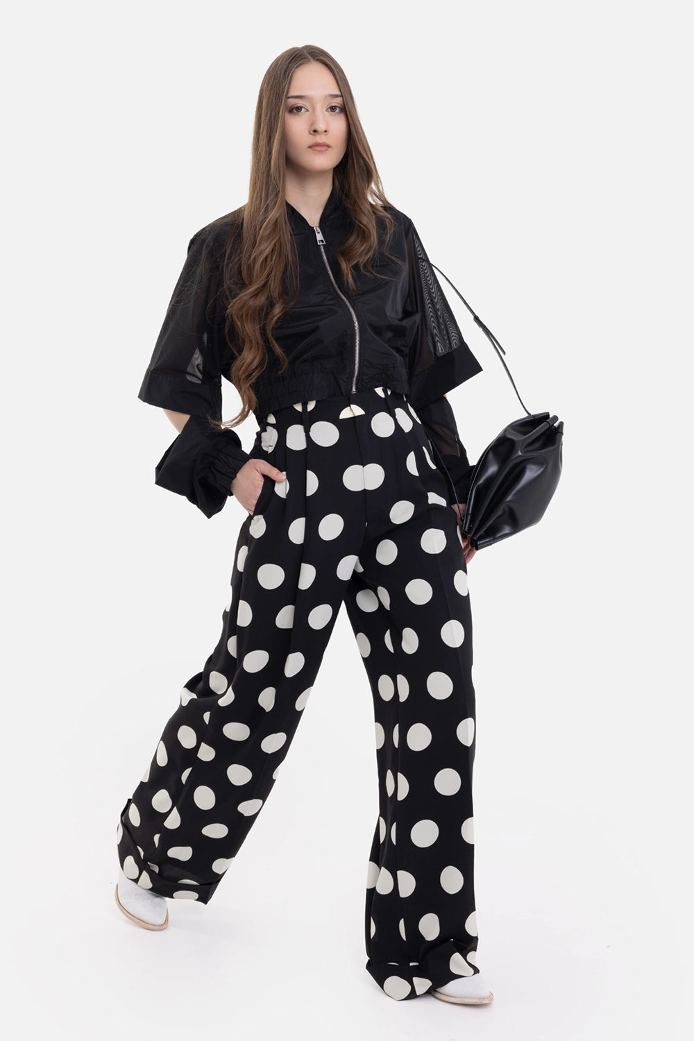 Junya Watanabe women's wide-leg trousers in black and white polka dot, on-model full length, cuffed hems