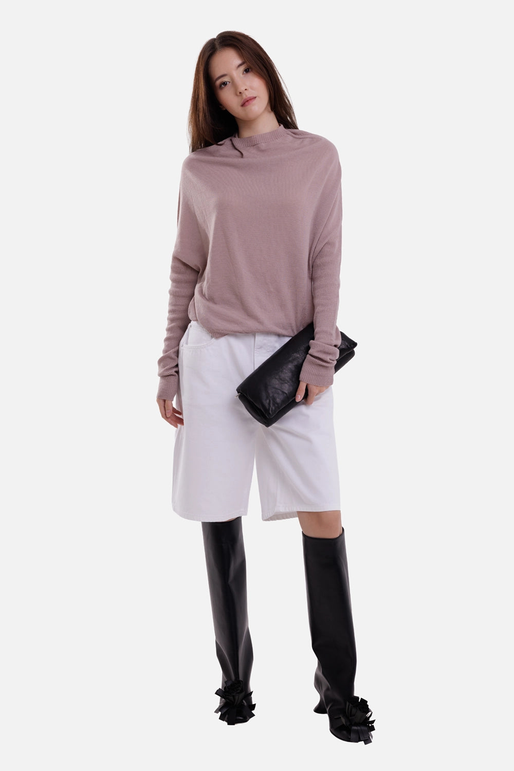 Rick Owens women's sweater in rose, on-model full-length view with dropped shoulders and long ribbed sleeves