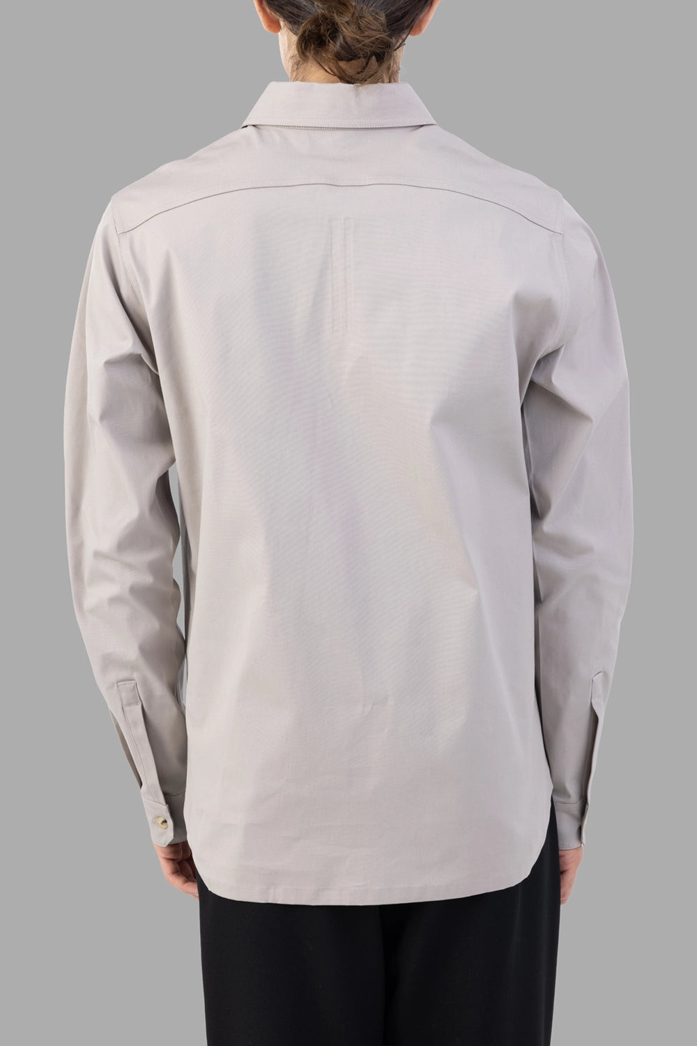 Rick Owens work shirt in pearl, back view, shaped hem and back yoke seam