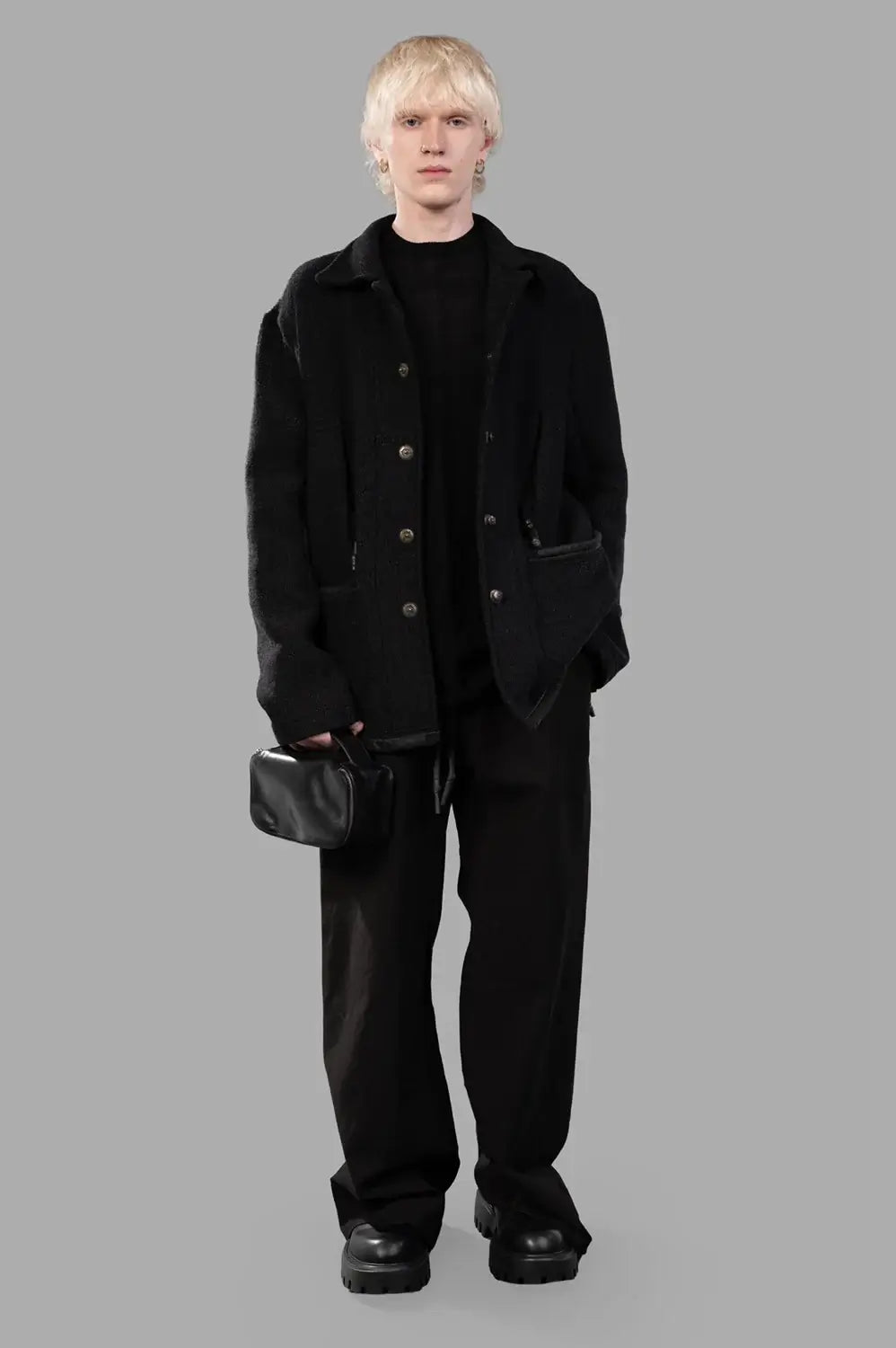 69 by Isaac Sellam worker jacket in Unique, on-model half length, four-button front and zip chest pockets