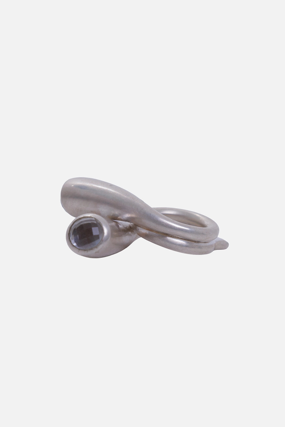 Kundo unisex wrap ring in silver-tone, side view with one faceted grey stone and an elongated curved profile
