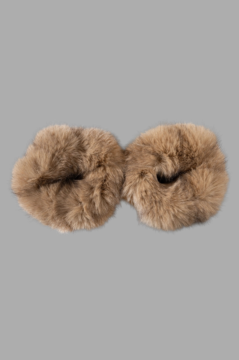 Pair of faux-fur wrist cuffs in tan, set of two with fluffy pile and elastic interior opening