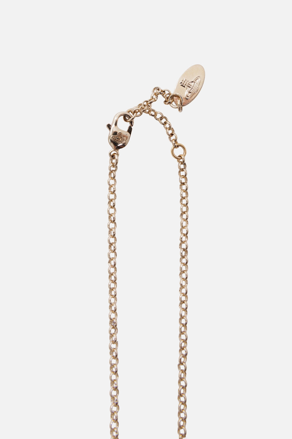 Vivienne Westwood women's Yasmine necklace in gold, closure close-up with lobster clasp, extender chain and engraved tag